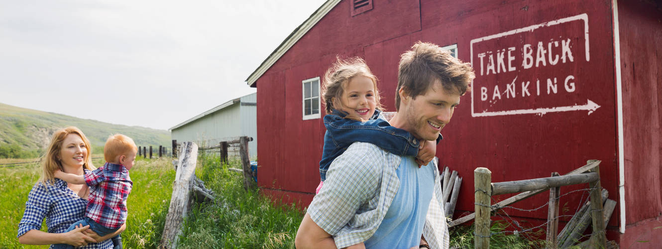 Take Back Banking ad with a red barn and a family walking out front. 