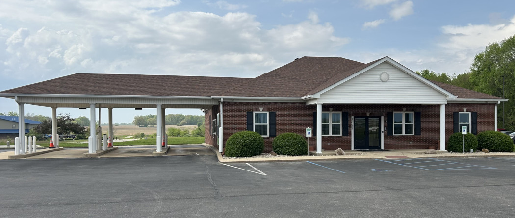 First National Bank Belleville location with a modern exterior, easy-to-find entrance, and convenient customer parking.