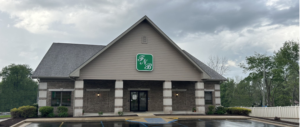 First National Bank Greencastle location with a modern exterior, easy-to-find entrance, and convenient customer parking.